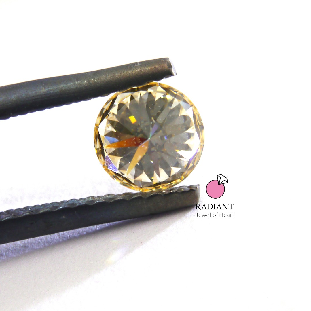 0.51 Natural Fancy Light Orange Yellow si1 Diamond