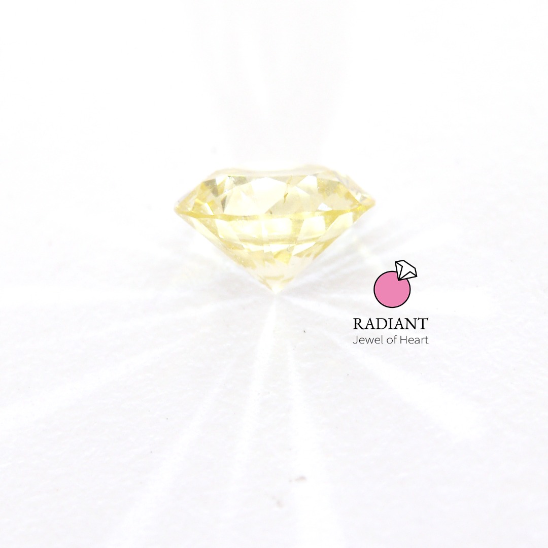 0.31 Natural Fancy Light Yellow I1 Diamond