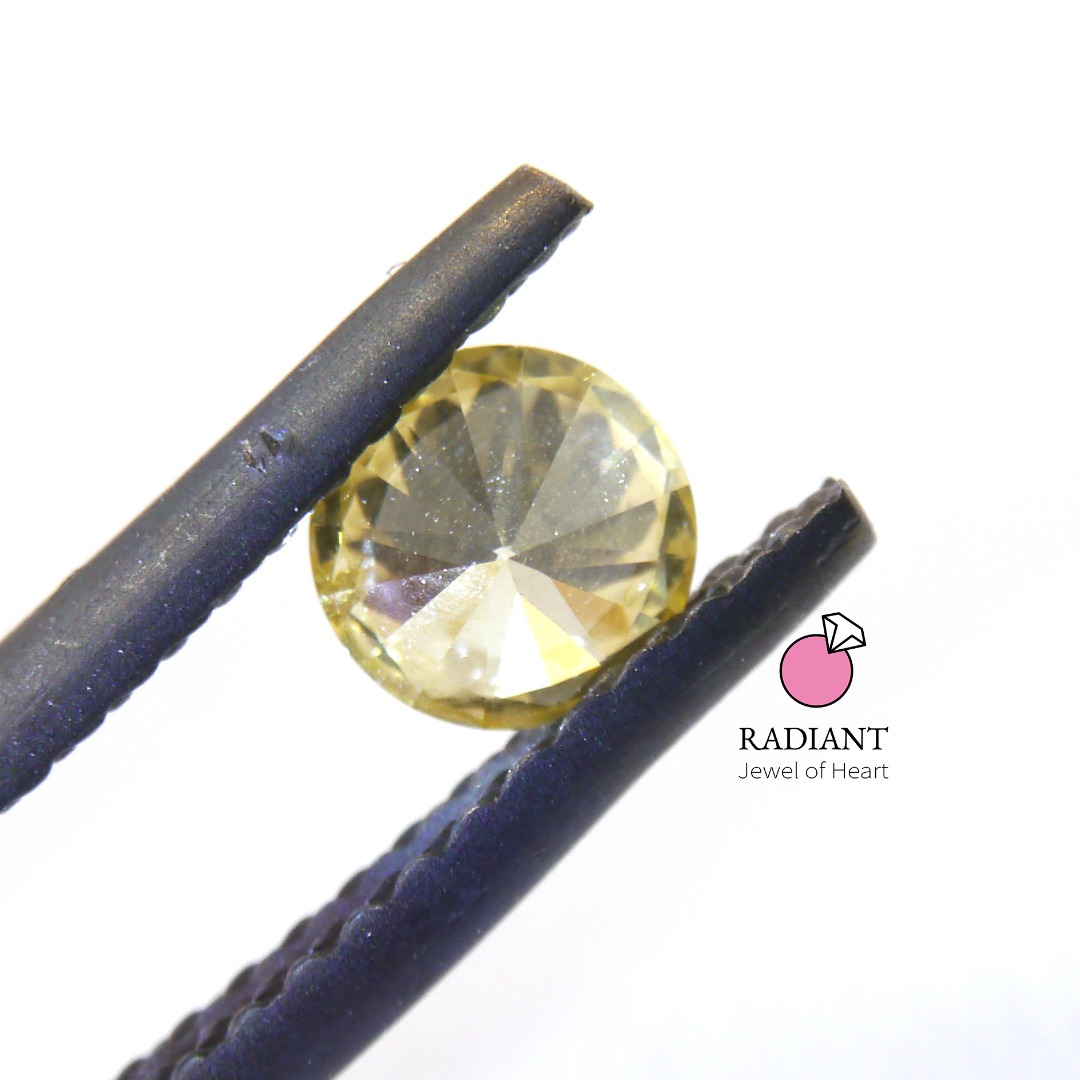 0.31 Natural Fancy Light Yellow I1 Diamond