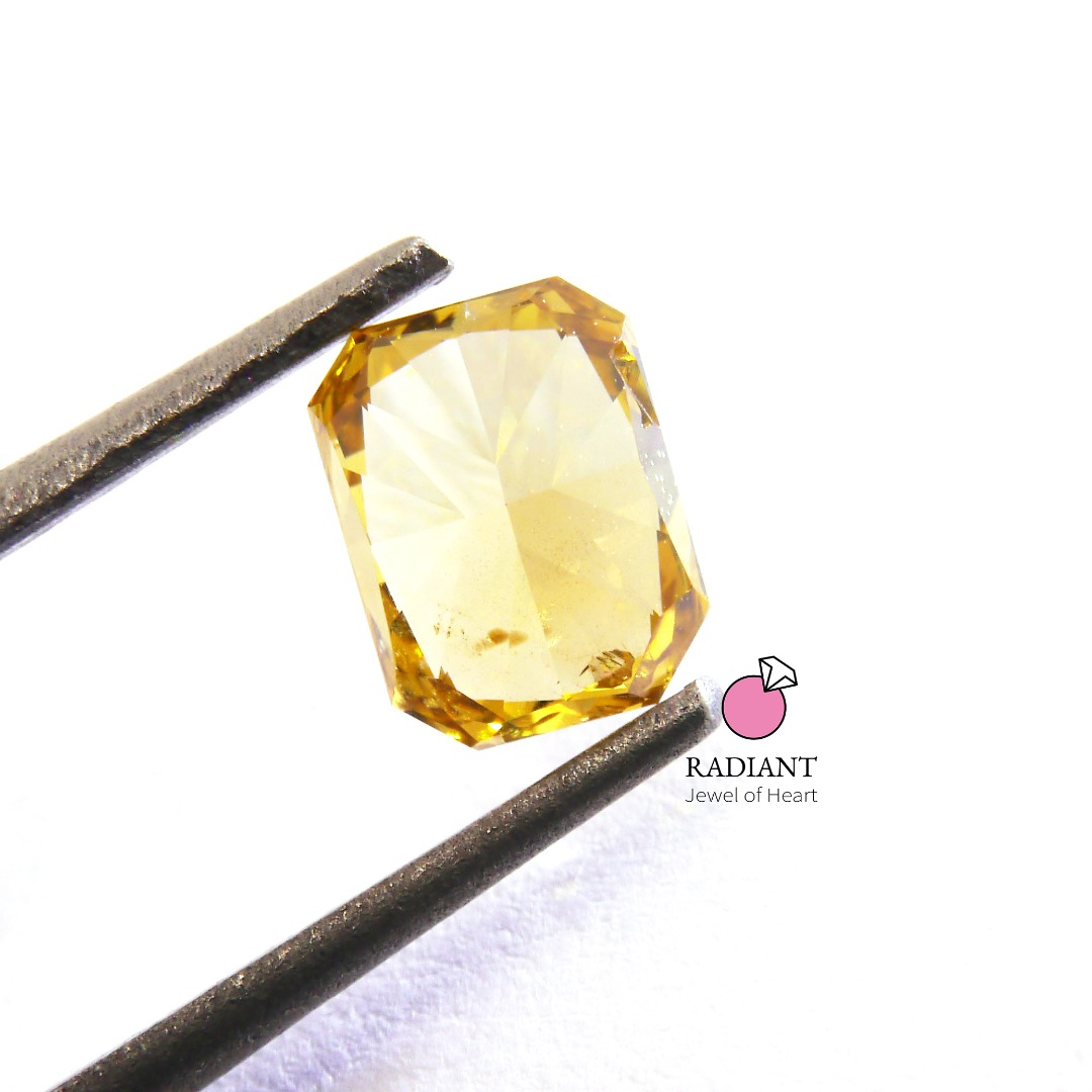 0.81 Natural Fancy Deep Brownish Orangy Yellow SI2 Diamond